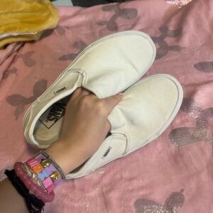 Vans Cream Slip-On Sneakers